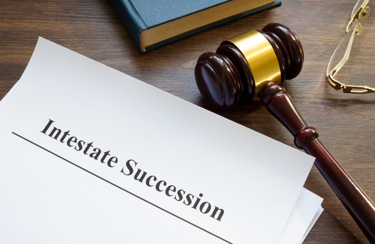 Intestate succession, judge's gavel and book on the table